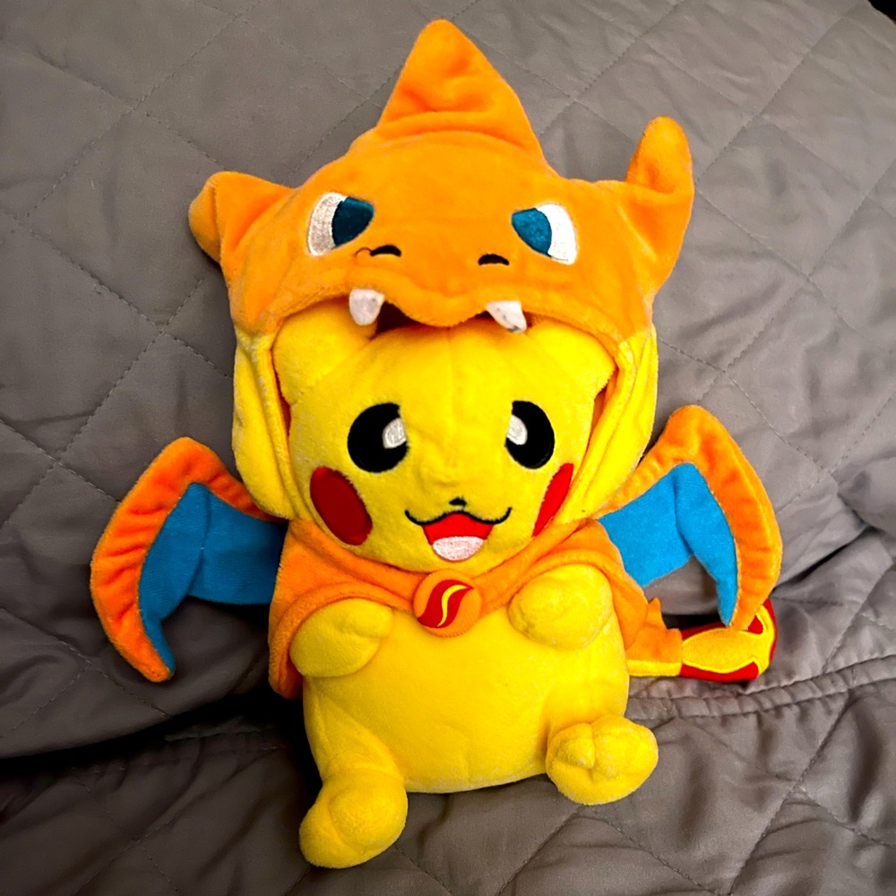 Pokemon Pikachu Mega Charizard  Y Poncho Plush Toy 8”. Ripped see in pictures